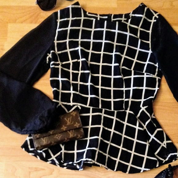 Tops - Peplum style ladies blouse.